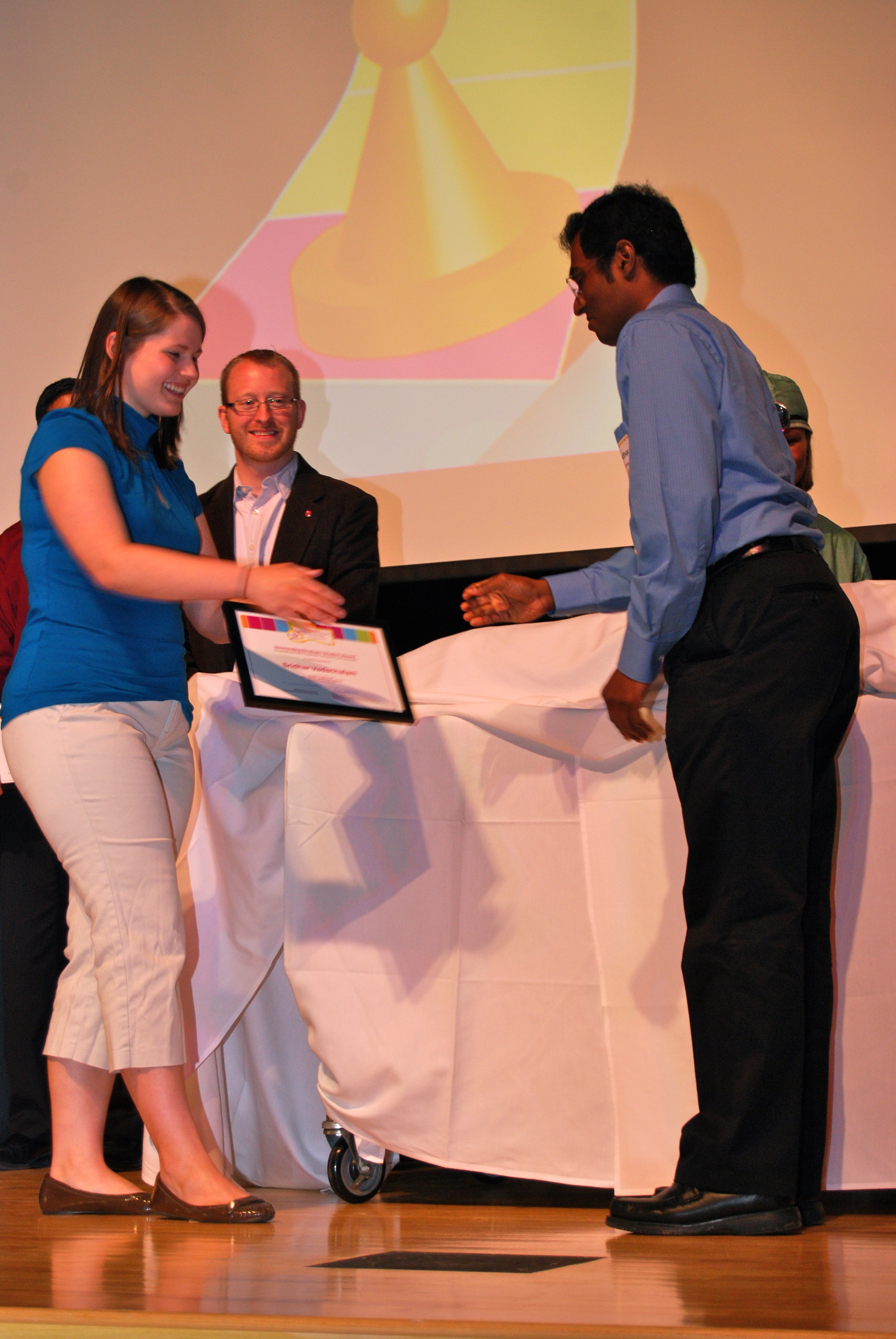  Sri receiving the Outstanding Graduate Student Award for Student Leadership at Ohio State
